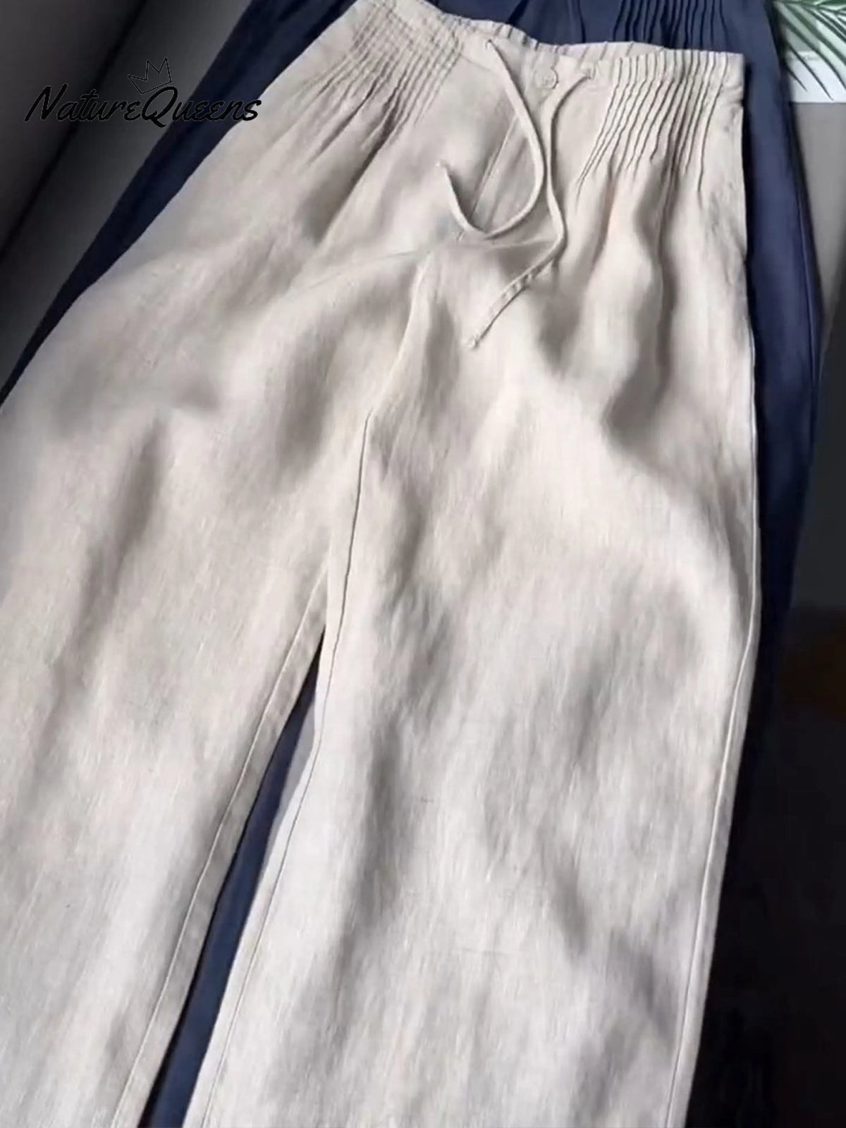 🔥Limited time promotion Women's Solid Color Pleated Drawstring Casual Cotton and Linen Wide Leg Pants